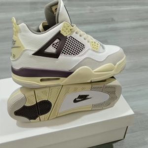 AJ4 white black and yellow